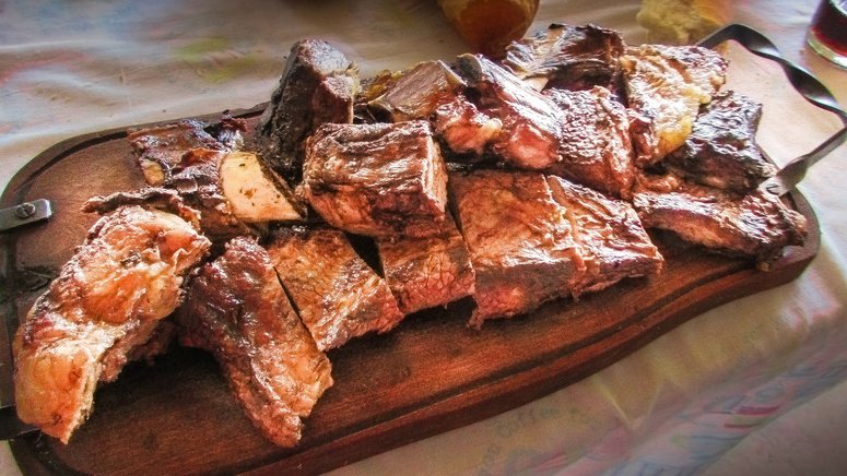 Degusta asado argentino auténtico porteño