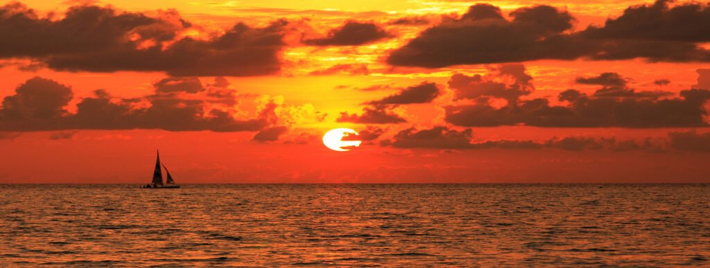 puesta sol catamaran castillo sancti petri
