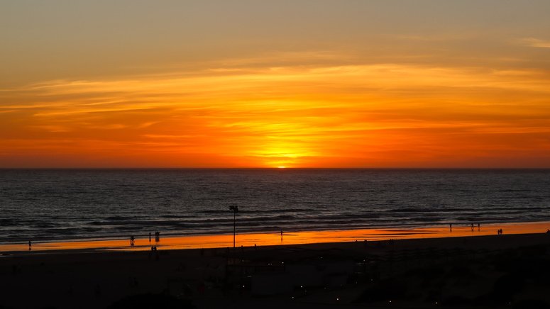 puesta sol catamaran castillo sancti petri