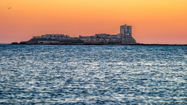 puesta sol catamaran castillo sancti petri